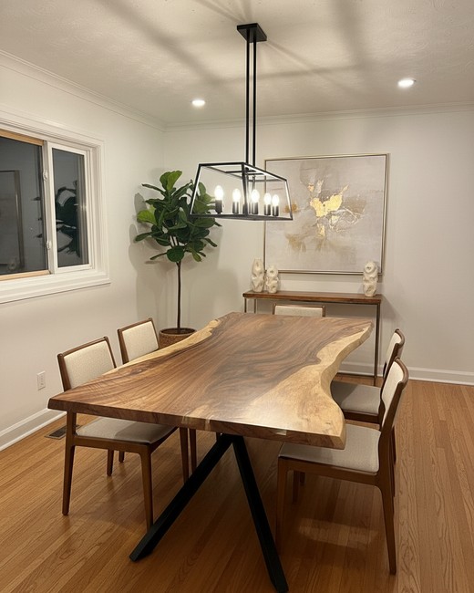 Parota dining table with spider base legs in dining room